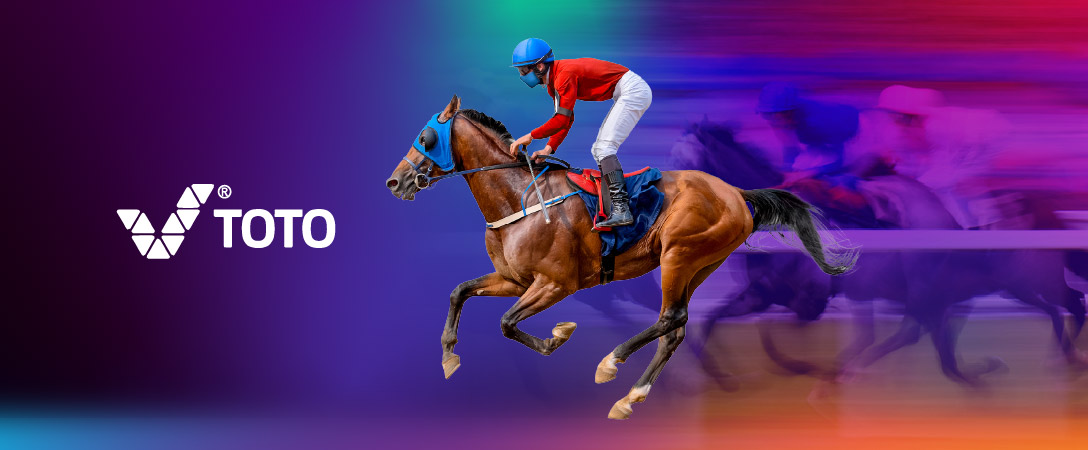 A jockey in red and white riding a racehorse, with the Toto logo on a vibrant purple and orange background, and blurred horses in the background.