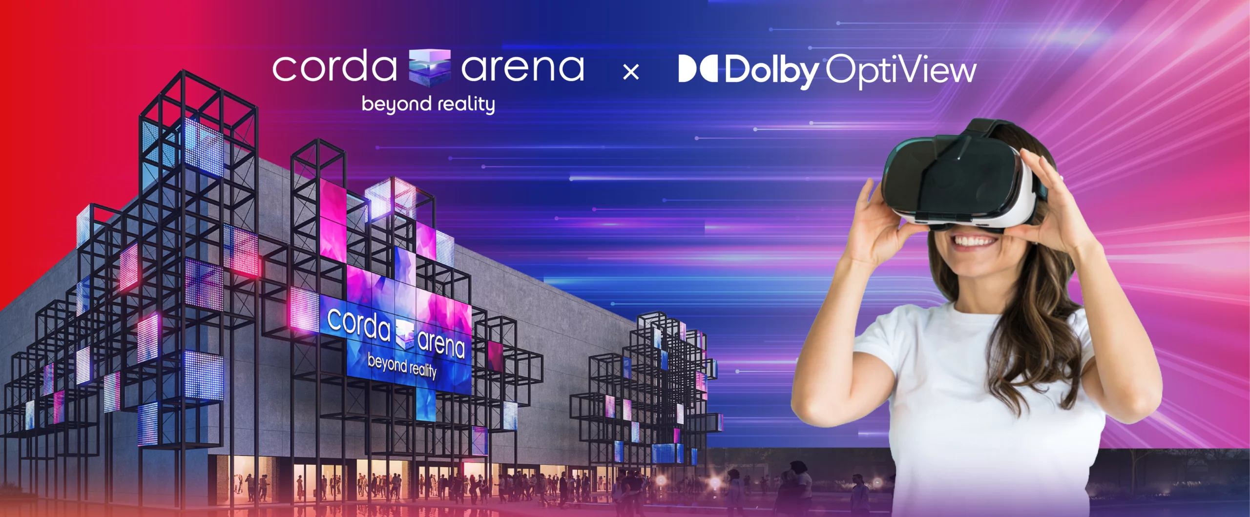  Corda Arena beyond reality venue exterior with illuminated LED displays alongside a person wearing a VR headset, featuring the Corda Arena and Dolby OptiView partnership logos